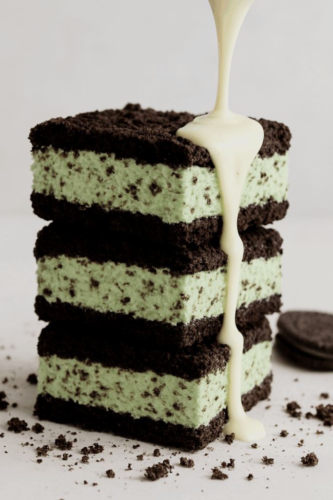 Low calorie Mint Oreo cheesecake cookies stacked on a plate, soft and chewy with a creamy mint filling, healthy dessert recipe for fitness lovers.