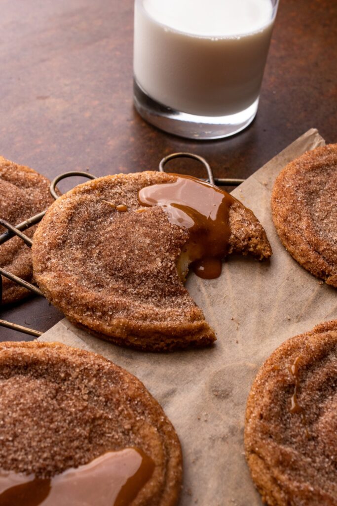 High protein Churro Cheesecake served with a glass of milk 