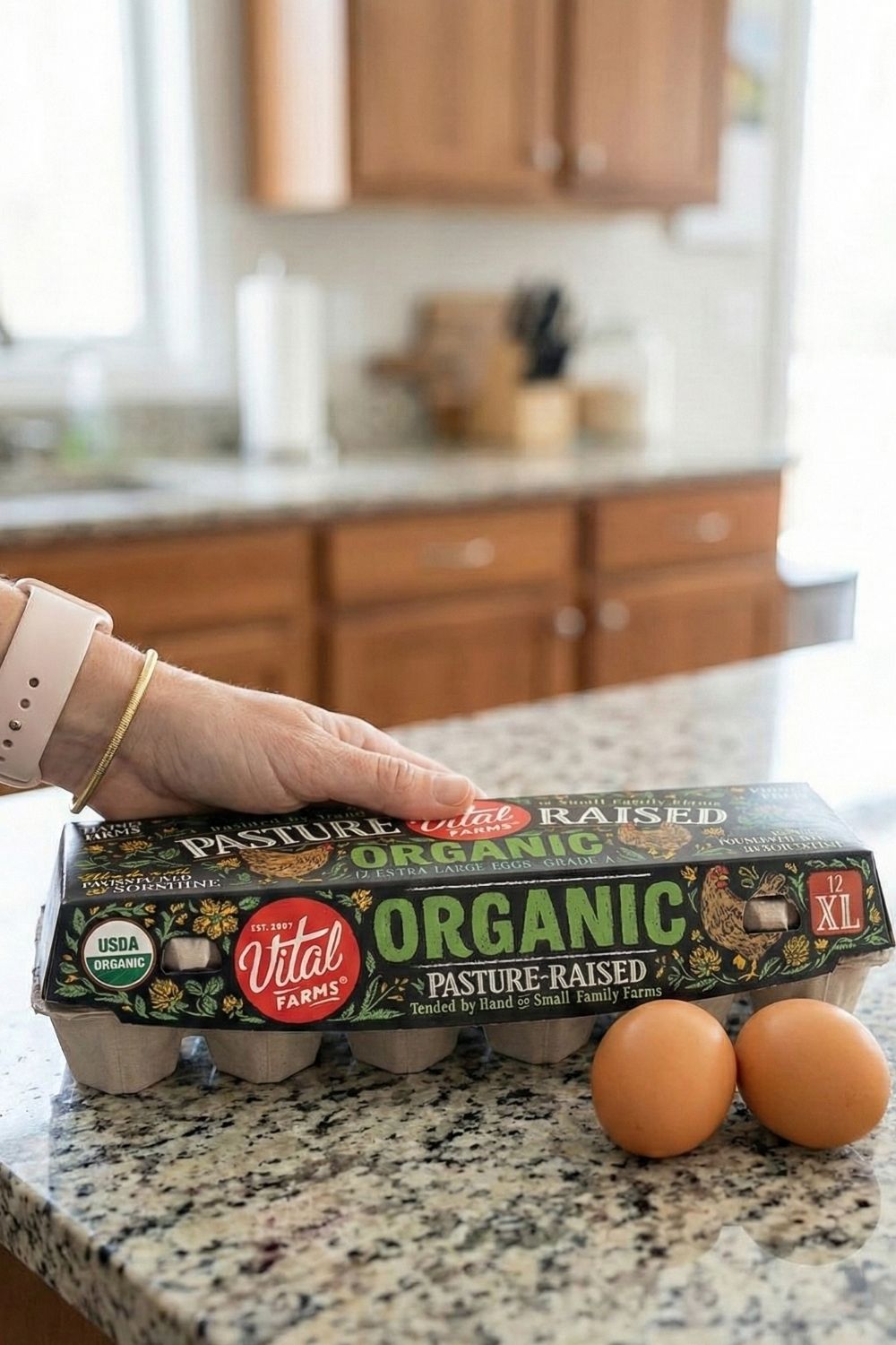 Vital Farms pasture-raised hard-boiled eggs on a kitchen counter. A budget-friendly, high-protein meal prep idea for healthy travel.